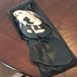 Belt with shell buckle